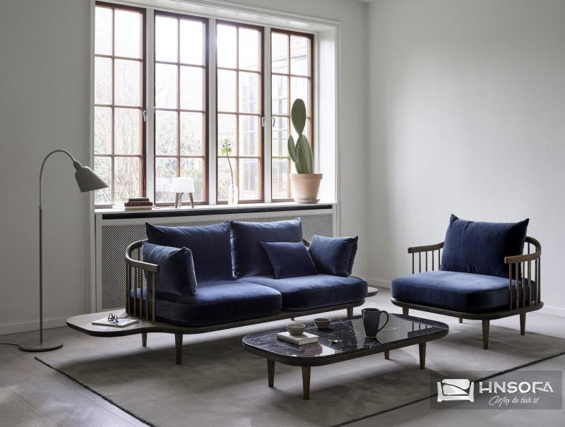 Đệm ngồi màu xanh dương tạo điểm nhấn cho sofa fly tạo điểm nhấn nổi bật và tăng thêm vẻ đẳng cấp cho không gian sống